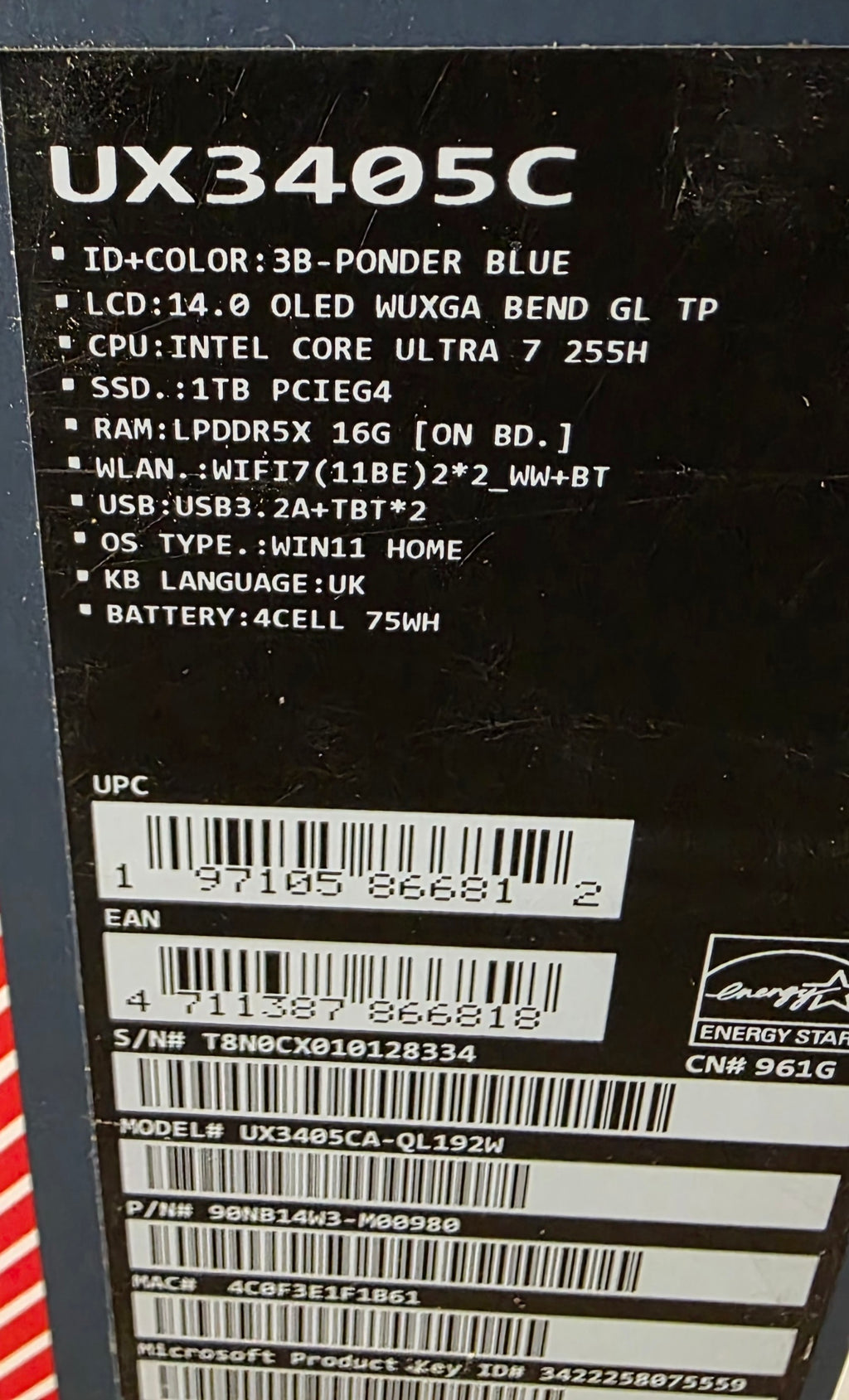 Back panel of a computer with model number UX3405C and technical specifications.