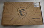 Cardboard box with gaming laptop design and logo on a gray background