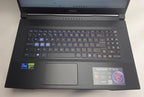 Black MSI laptop on a white surface